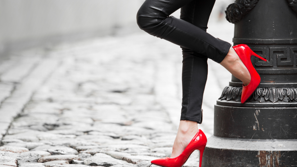 a lady with red heals 